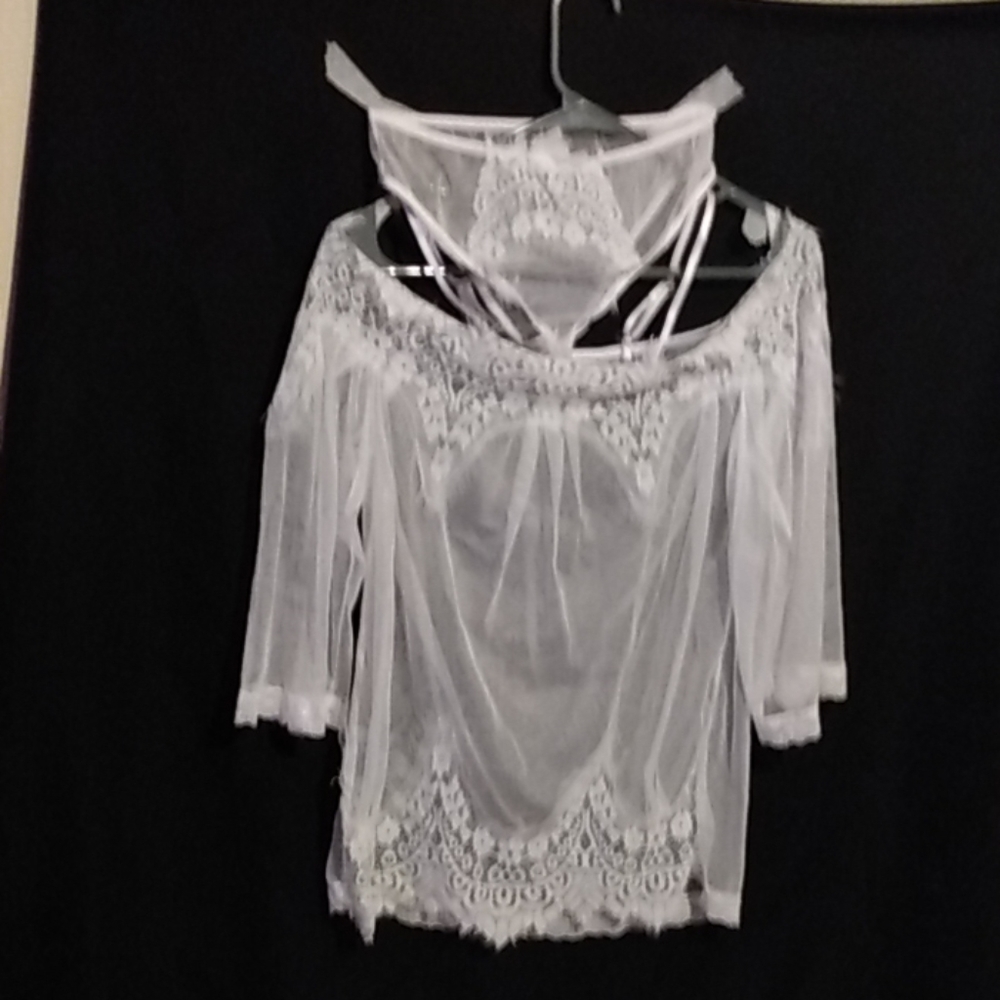 Brand new white undergarments the top and the bott